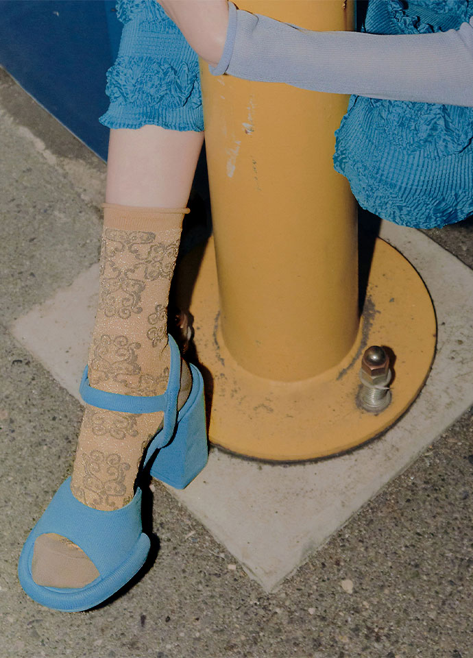 鎏金華飾不對稱設計針織中長襪